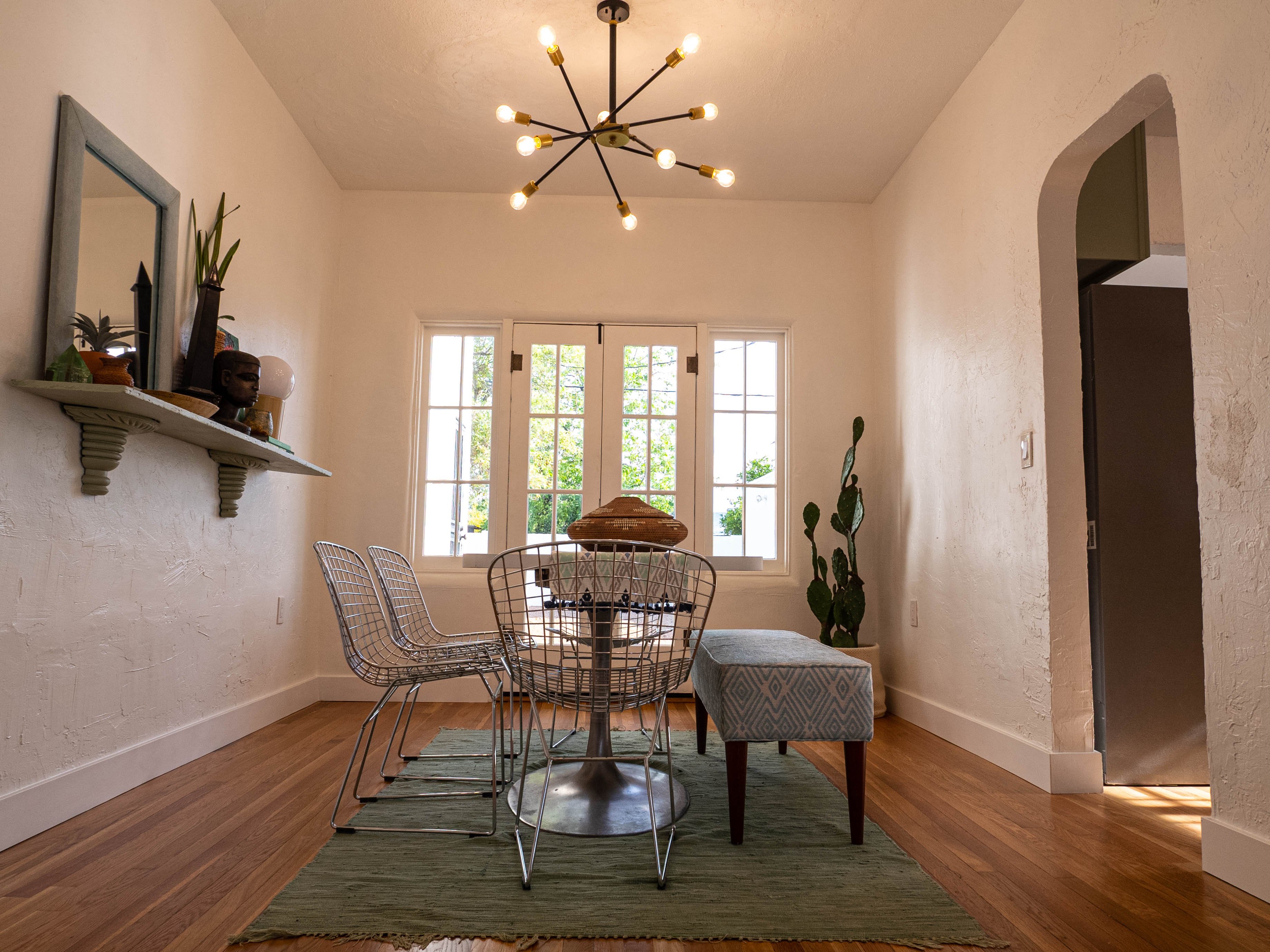 Decorated dining room, Home with Spanish tile roof has great curb appeal after the homeowner used one of The District's alternative ways to sell your house